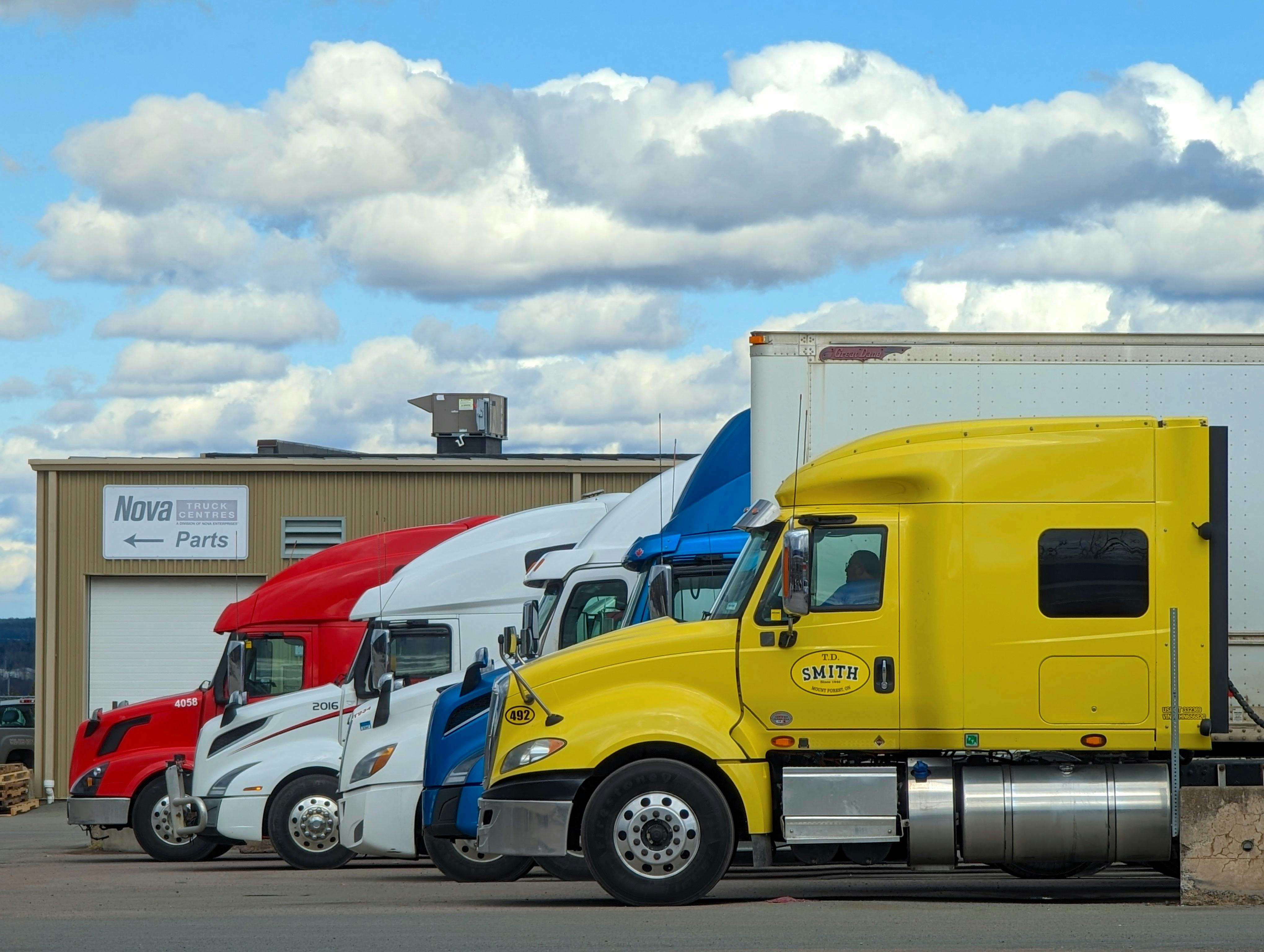 Commercial truck on the highway representing trucking insurance