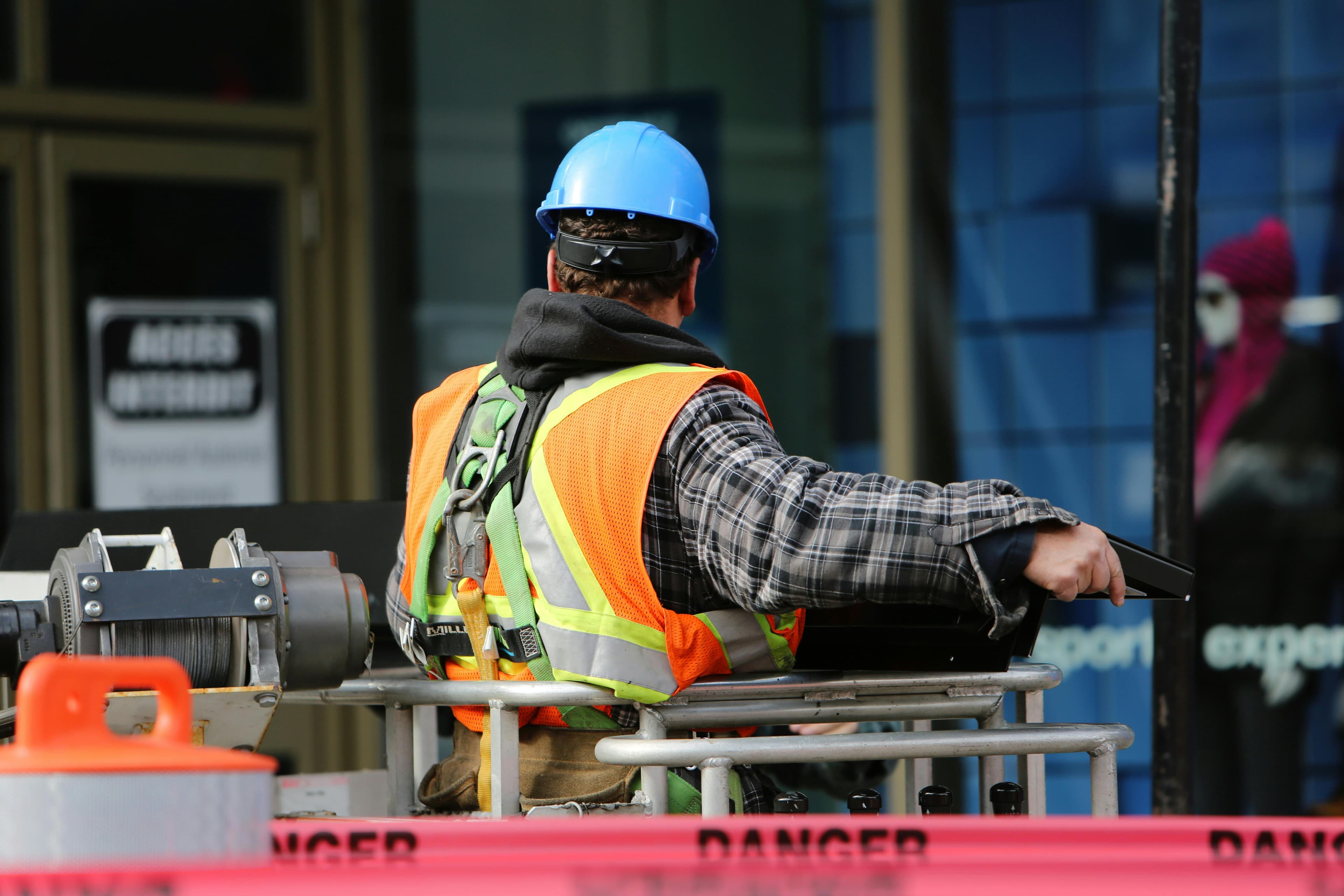 Construction worker in safety gear representing workers compensation insurance